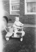 Showing daredevil driving style. Age 9 mos.